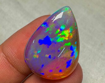 OPAL Welo Ethiopian - Rare Unique Pcs Best Quality -  Full Flash Galaxy Pin Fire - Pear  Shape Cabochon  Size - 18.5x 25 mm Height- 7