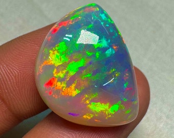 OPAL Welo Ethiopian - Rare Unique Pcs Best Quality -  Full Flash Galaxy Pin Fire - Fancy  Shape Cabochon  Size - 18x25 mm Height-10