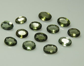 Moldavite -  Natural Green Color Fine Cut Faceted Oval High Quality 100 % Natural Genuine Stone Mix Size Lot size -3x5 -4x6 mm - 13pcs