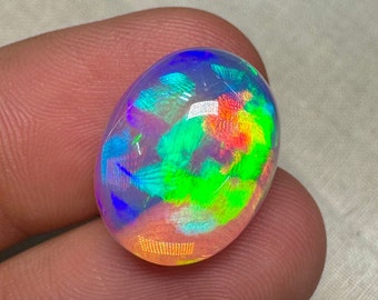 OPAL Welo Ethiopian - Rare Unique Pcs Best Quality -  Full Flash Galaxy Pin Fire - Oval Shape Cabochon  Size - 14x18  mm Height- 8