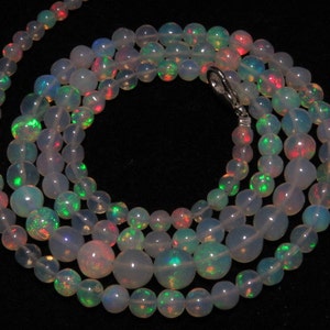 Welo Ethiopian Opal 22 Inches High Quality Smooth Polished Round Ball Beads Full Color Full Flashy Fire size 4 7 mm approx image 4