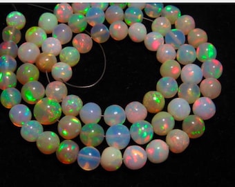 Welo Ethiopian Opal - 16 Inches - Top Grade High Quality Smooth Polished Round Ball Beads Full Color Full Flashy Fire Huge size - 5.5 - 6 mm