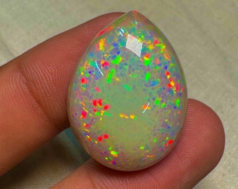 OPAL Welo Ethiopian - Rare Unique Pcs Best Quality -  Full Flash Galaxy Pin Fire - Pear  Shape Cabochon  Size - 22x28.5 mm Height-  10