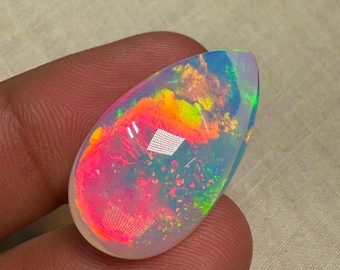 OPAL Welo Ethiopian - Rare Unique Pcs Best Quality -  Full Flash Galaxy Pin Fire - Pear  Shape Cabochon  Size - 16.5x29 mm Height- 7