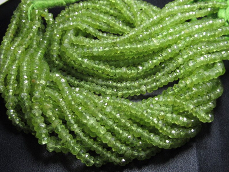 gorgeous micro faceted parrot beads size 3 mm approx peridot green whoalsalle so whoalsell 10strand x 14 inches