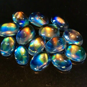 Rainbow Moonstone Cabochons: Oval Gemstones with Rainbow Flash (4x6 mm - 10 pcs)