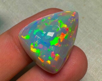 OPAL Welo Ethiopian - Rare Unique Pcs Best Quality -  Full Flash Galaxy Pin Fire - Fancy  Shape Cabochon  Size - 21x25 mm Height- 14