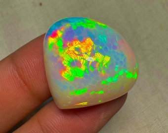 OPAL Welo Ethiopian - Rare Unique Pcs Best Quality -  Full Flash Galaxy Pin Fire - Pear Shape Cabochon  Size - 29x26mm  Height -14 mm