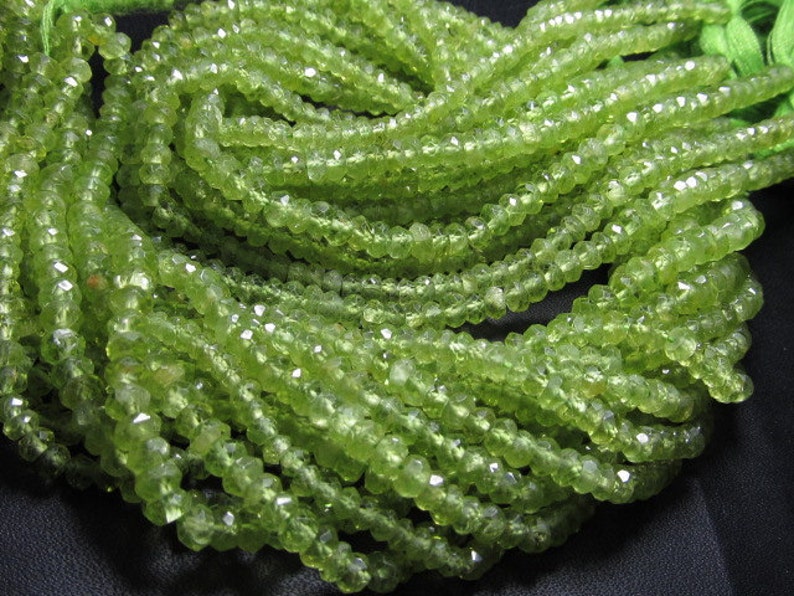 gorgeous micro faceted parrot beads size 3 mm approx peridot green whoalsalle so whoalsell 10strand x 14 inches