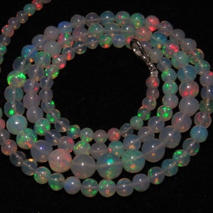 Welo Ethiopian Opal 22 Inches High Quality Smooth Polished Round Ball Beads Full Color Full Flashy Fire size 4 7 mm approx image 1