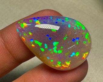 OPAL Welo Ethiopian - Rare Unique Pcs Best Quality -  Full Flash Galaxy Pin Fire - Pear  Shape Cabochon  Size - 20x30  mm Height- 8