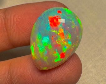 OPAL Welo Ethiopian - Rare Unique Pcs Best Quality -  Full Flash Galaxy Pin Fire - Pear  Shape Cabochon  Size - 17.5x23mm Height-12.5