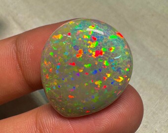 OPAL Welo Ethiopian - Rare Unique Pcs Best Quality -  Full Flash Galaxy Pin Fire - Pear  Shape Cabochon  Size - 22x25.5 mm Height-  8.5