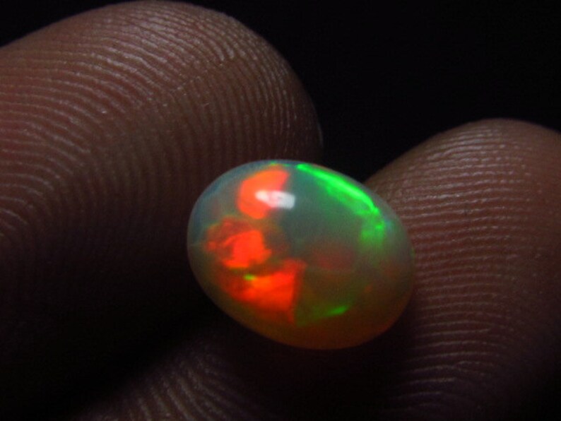 Amazing Green Red Mix Fire 6x9 mm Oval Cut Cabochon WELO ETHIOPIAN OPAL