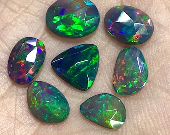 Opal - AAAA+++  welo Ethiopian Opal Natural opal - Black Smoked Opals Fine Cut Rose Cut slices super sparkle - size 7x9 - 8x11 mm - 7 pcs