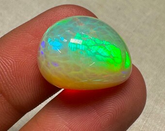 OPAL Welo Ethiopian - Rare Unique Pcs Best Quality -  Full Flash Galaxy Pin Fire - Fancy  Shape Cabochon  Size - 15x19 mm Height- 10.5