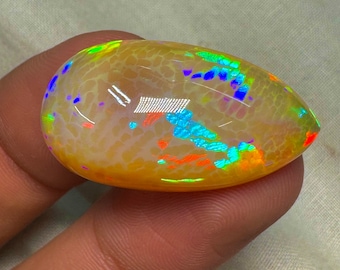 OPAL Welo Ethiopian - Rare Unique Pcs Best Quality -  Full Flash Galaxy Pin Fire - Pear Shape Cabochon  Size - 17x30 mm  Height -10 mm