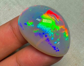 OPAL Welo Ethiopian - Rare Unique Pcs Best Quality -  Full Flash Galaxy Pin Fire - Fancy  Shape Cabochon  Size - 22x31.5  mm Height- 10.5