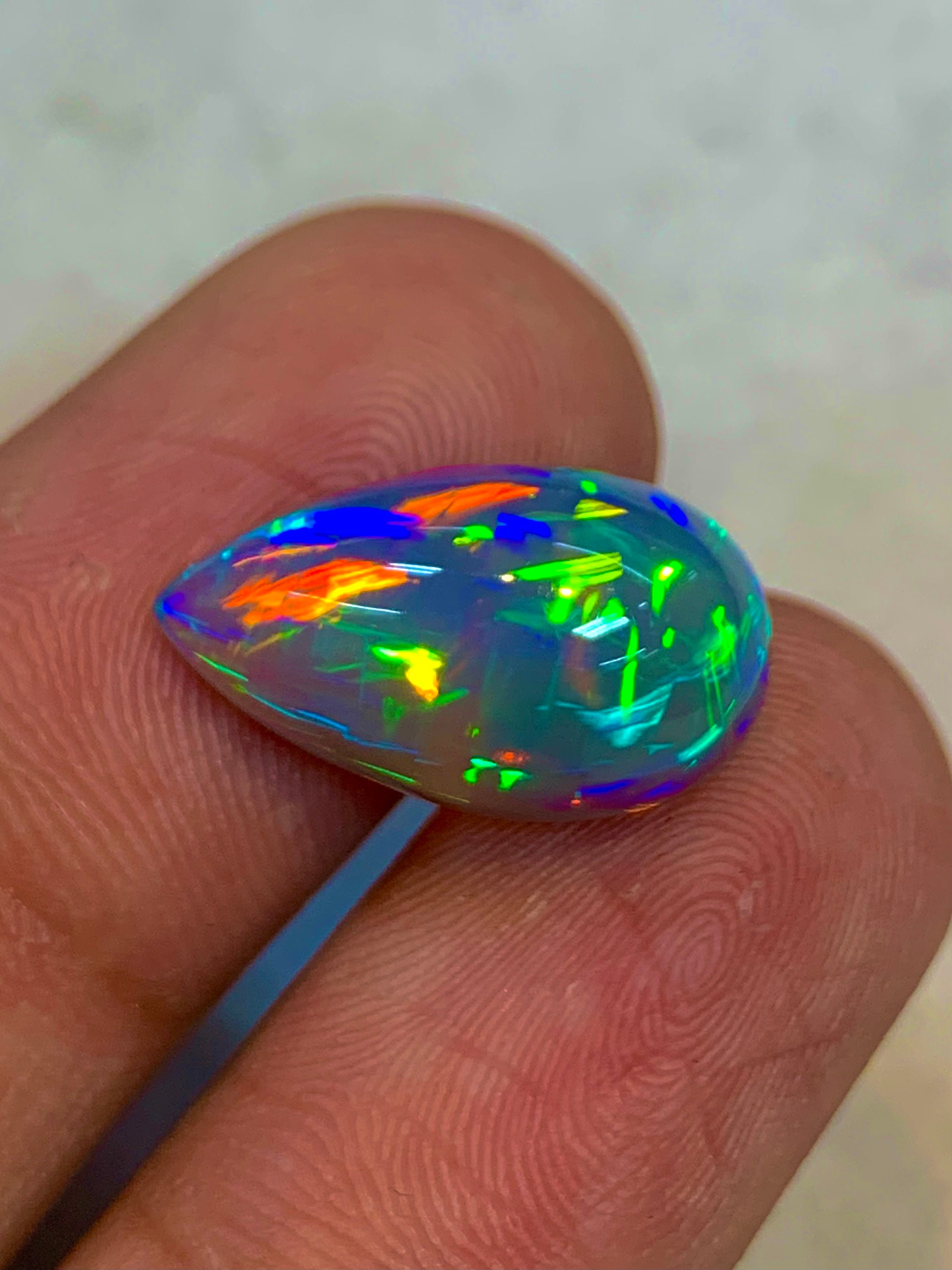 ひろ❣️お取り置き　大粒天然ルビーカボション＆エメラルドブレスレット ウェロ エチオピアン オパール カボション：ペアシェイプ ギャラクシー