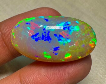 OPAL Welo Ethiopian - Rare Unique Pcs Best Quality -  Full Flash Galaxy Pin Fire -  Oval  Shape Cabochon  Size - 16.5x31 mm Height- 11.5