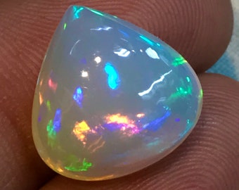 OPAL Welo Ethiopian - Rare Unique Pcs Best Quality -  Full Flash Galaxy  Fire -  Cabochon  Size - 14x14 mm  Height - 7.5 mm