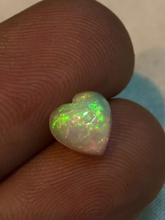 Ethiopian Welo Opal Heart Cabochon: Green Red Fire, AAA Quality (7x7 mm)