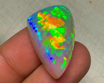 OPAL Welo Ethiopian - Rare Unique Pcs Best Quality -  Full Flash Galaxy Pin Fire - Fancy  Shape Cabochon  Size - 17x25 mm Height- 13