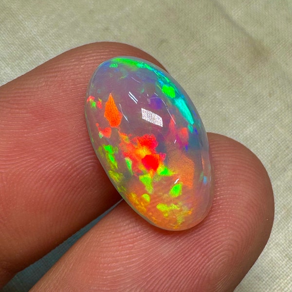 OPAL Welo Ethiopian - Rare Unique Pcs Best Quality -  Full Flash Galaxy Pin Fire - Oval  Shape Cabochon  Size - 11x18mm Height - 6.5 mm