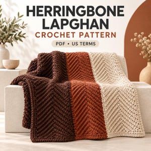 May include: A crochet blanket featuring a herringbone stitch pattern in three vertical color blocks of dark brown, rust orange, and cream. The text reads HERRINGBONE LAPGHAN CROCHET PATTERN PDF US TERMS. The blanket is draped over a block.