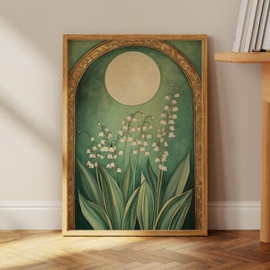 May include: A framed art print featuring a botanical illustration of lily of the valley flowers. The artwork has a vintage aesthetic with a green and gold color palette. The flowers are white, and the leaves are green.