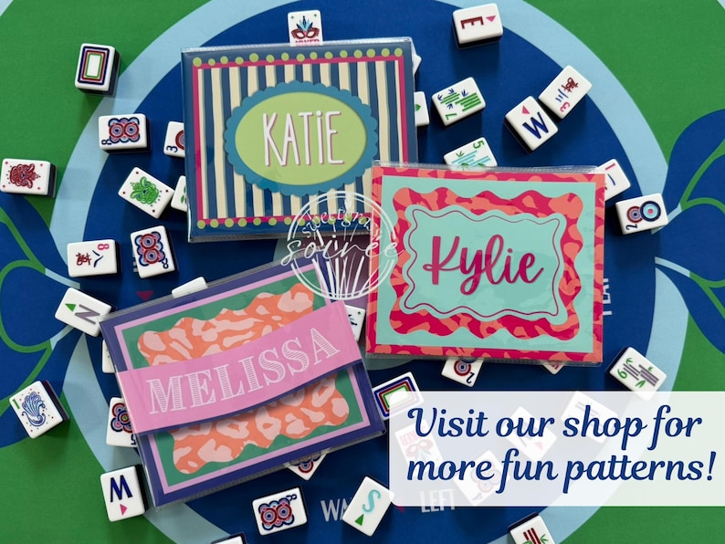 May include: Three personalized gift boxes with names "Katie", "Kylie", and "Melissa" in different fonts and colors. The boxes are surrounded by Mahjong tiles on a blue and green patterned surface. Text on the image says "Visit our shop for more fun patterns!"