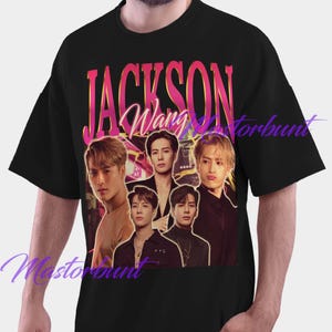May include: Black t-shirt featuring a graphic of five men with the text "JACKSON Wang" in a pink and yellow gradient. The design has a vintage, retro style. The shirt is a crew neck.