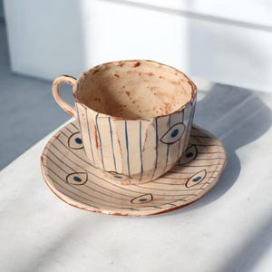 Handmade Ceramic Coffee Mug and Saucer Set: Evil Eye Pottery, Tea Cup