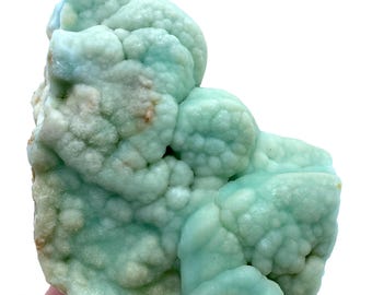 May include: A large, light blue, green, and brown,  botryoidal celestite specimen. The celestite has a bubbly, textured surface.