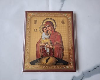 Icono ortodoxo serbio de la Virgen María y Jesucristo en oración.