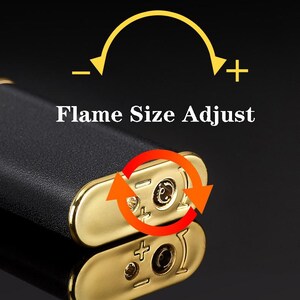 May include: A black lighter with a gold trim and a flame size adjustment knob. The knob has plus and minus symbols to indicate how to adjust the flame size.