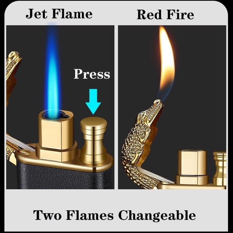 May include: A gold-toned lighter with a crocodile head design. The lighter has two flames: a blue jet flame and a red fire flame. The text "Press" with a downward arrow is visible on the lighter. The text "Two Flames Changeable" is also visible.