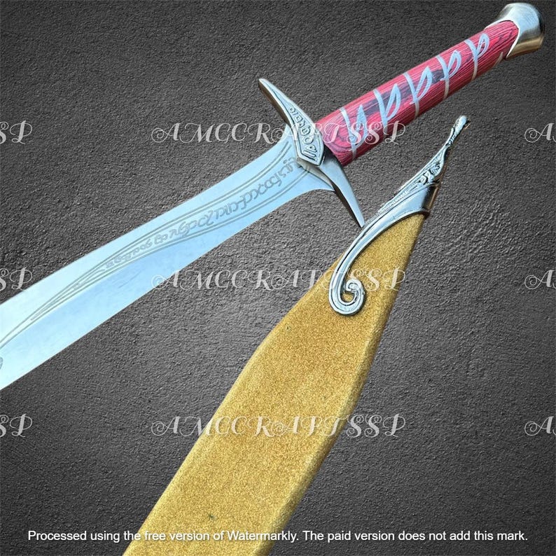 May include: A detailed image of a sword with a silver blade and a red and silver handle. The sword has an inscription on the blade and is partially sheathed in a gold-colored scabbard. The handle has a red wood grain pattern.