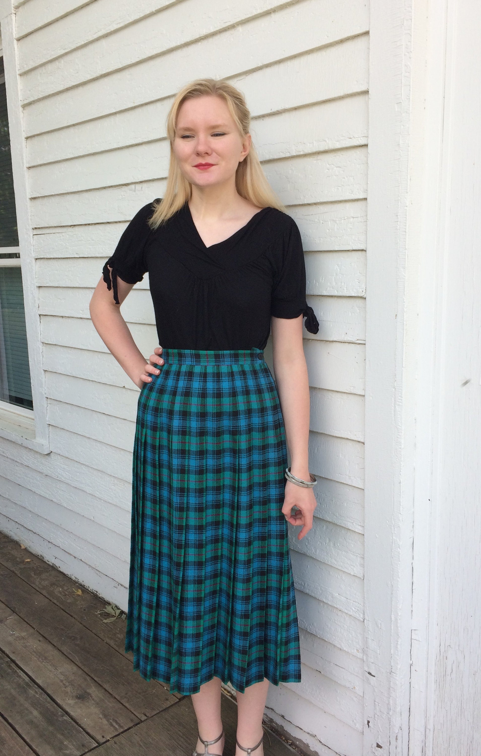 pleated green wool skirt