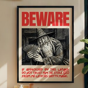 May include: A framed poster with the word "BEWARE" in red block letters. Below, a black and white illustration of a wizard holding money. The text warns against trusting the wizard, who stole $20.