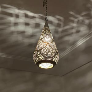 moroccan pendant, brass pendant light, ceiling lamp, boho lighting decor, lantern lamp, moroccan chandelier, handmade brass lamp, lighting, oriental pendant, bohemian ceiling, etched brass light, warm ambient lamp, luxury home light