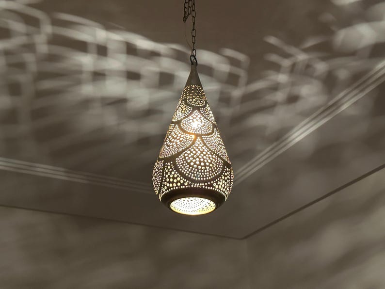 moroccan pendant, brass pendant light, ceiling lamp, boho lighting decor, lantern lamp, moroccan chandelier, handmade brass lamp, lighting, oriental pendant, bohemian ceiling, etched brass light, warm ambient lamp, luxury home light