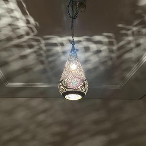 moroccan pendant, brass pendant light, ceiling lamp, boho lighting decor, lantern lamp, moroccan chandelier, handmade brass lamp, lighting, oriental pendant, bohemian ceiling, etched brass light, warm ambient lamp, luxury home light