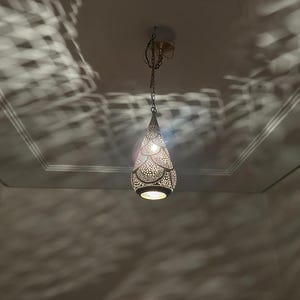 moroccan pendant, brass pendant light, ceiling lamp, boho lighting decor, lantern lamp, moroccan chandelier, handmade brass lamp, lighting, oriental pendant, bohemian ceiling, etched brass light, warm ambient lamp, luxury home light