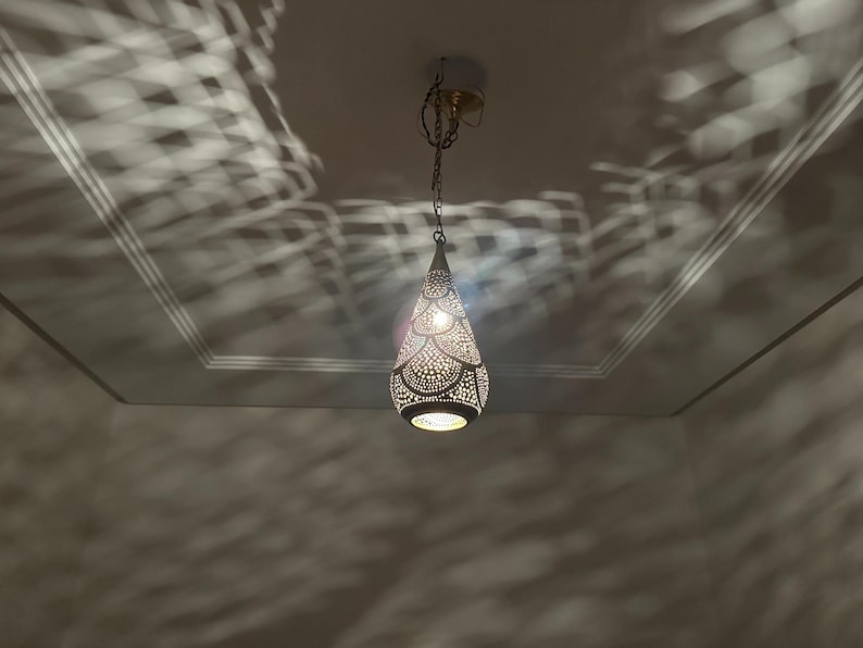 moroccan pendant, brass pendant light, ceiling lamp, boho lighting decor, lantern lamp, moroccan chandelier, handmade brass lamp, lighting, oriental pendant, bohemian ceiling, etched brass light, warm ambient lamp, luxury home light