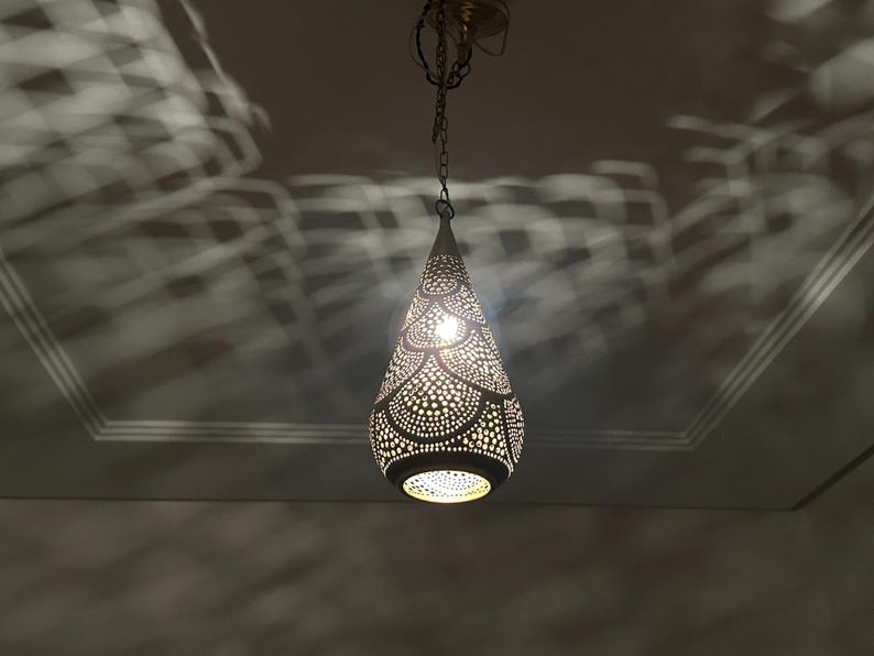 moroccan pendant, brass pendant light, ceiling lamp, boho lighting decor, lantern lamp, moroccan chandelier, handmade brass lamp, lighting, oriental pendant, bohemian ceiling, etched brass light, warm ambient lamp, luxury home light