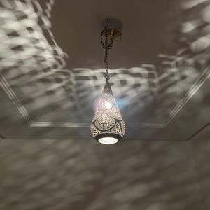 moroccan pendant, brass pendant light, ceiling lamp, boho lighting decor, lantern lamp, moroccan chandelier, handmade brass lamp, lighting, oriental pendant, bohemian ceiling, etched brass light, warm ambient lamp, luxury home light