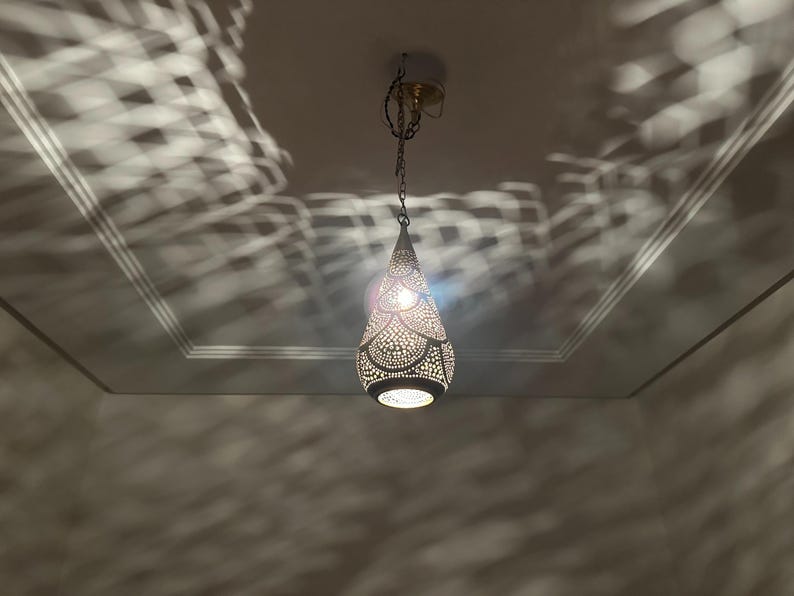 moroccan pendant, brass pendant light, ceiling lamp, boho lighting decor, lantern lamp, moroccan chandelier, handmade brass lamp, lighting, oriental pendant, bohemian ceiling, etched brass light, warm ambient lamp, luxury home light