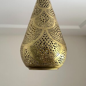 moroccan pendant, brass pendant light, ceiling lamp, boho lighting decor, lantern lamp, moroccan chandelier, handmade brass lamp, lighting, oriental pendant, bohemian ceiling, etched brass light, warm ambient lamp, luxury home light