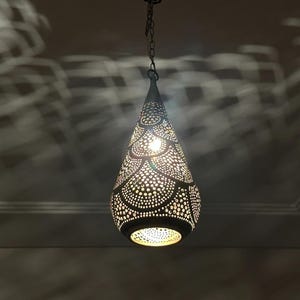 moroccan pendant, brass pendant light, ceiling lamp, boho lighting decor, lantern lamp, moroccan chandelier, handmade brass lamp, lighting, oriental pendant, bohemian ceiling, etched brass light, warm ambient lamp, luxury home light